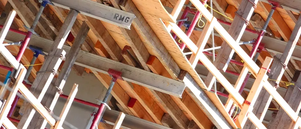 Construction formwork and timber props on a building site