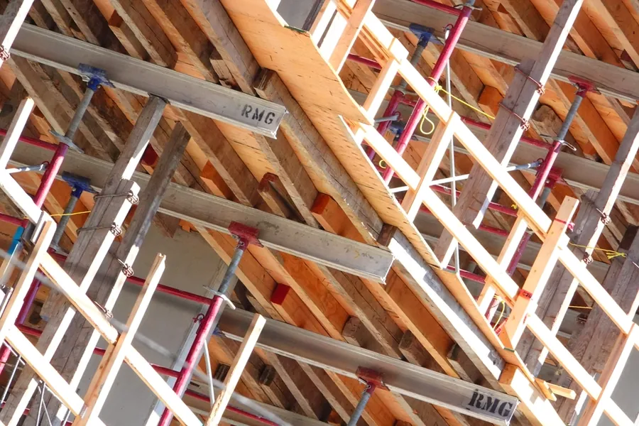 Construction formwork and timber props on a building site