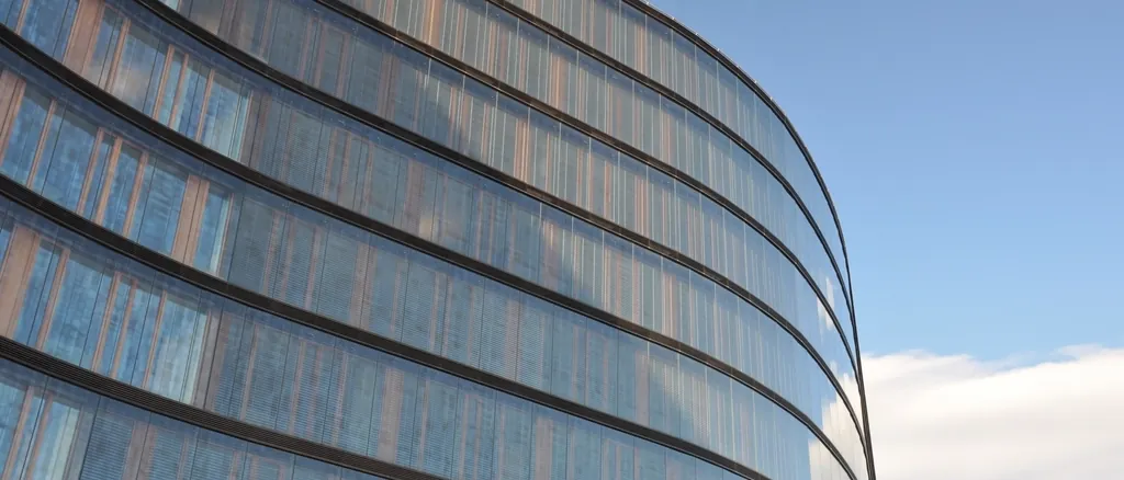 Curved glass facade of a commercial building