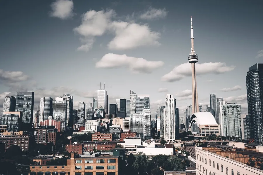 City skyline showing a dense mix of towers and low-rise blocks