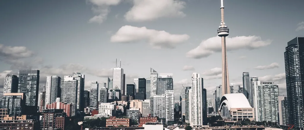 City skyline showing a dense mix of towers and low-rise blocks